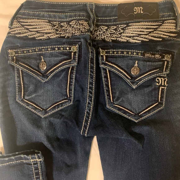jeans with wings on back pockets